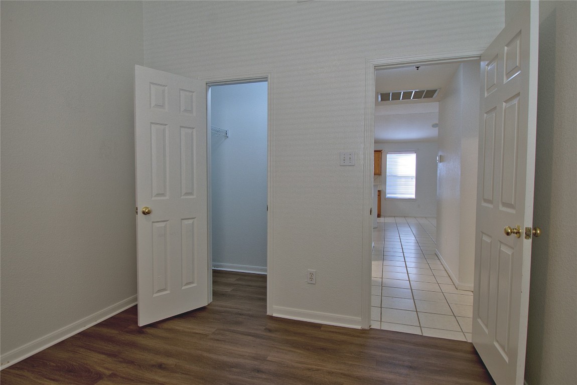 120 Greenside Lane Georgetown, TX 78633 - Photo 13 of 27 a view of empty room with wooden floor
