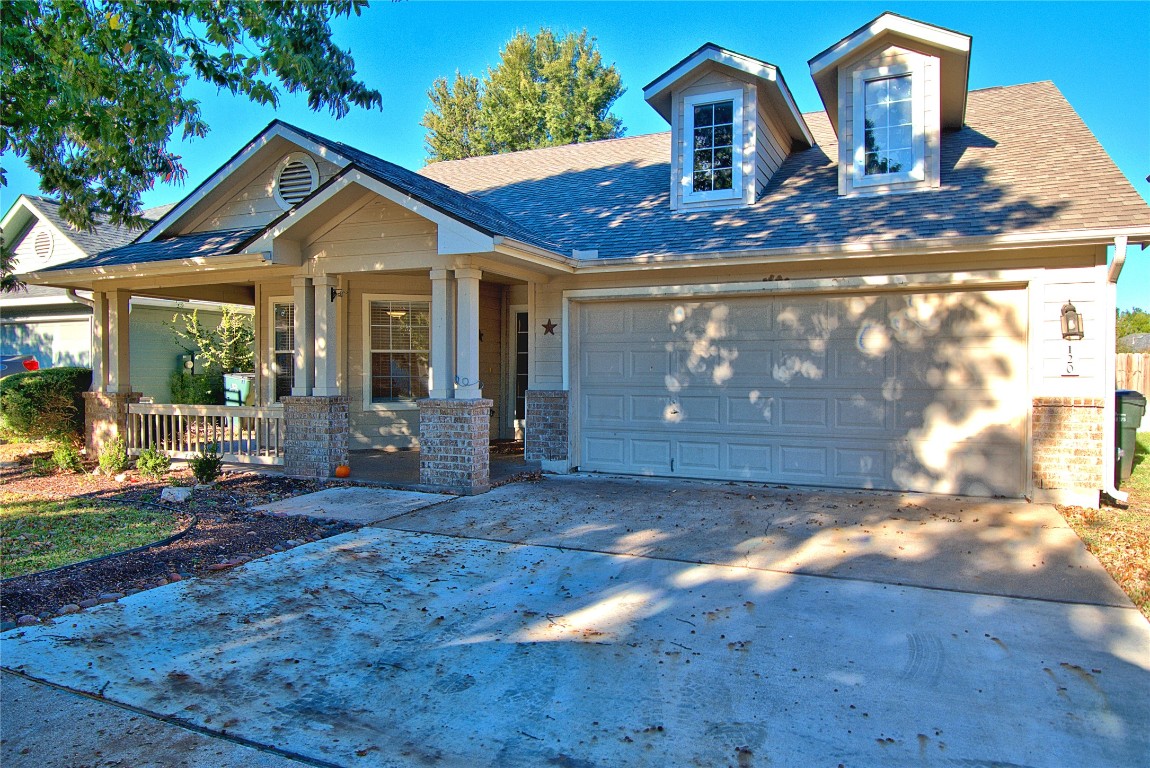 120 Greenside Lane Georgetown, TX 78633 - Photo 2 of 27 a front view of a house with yard