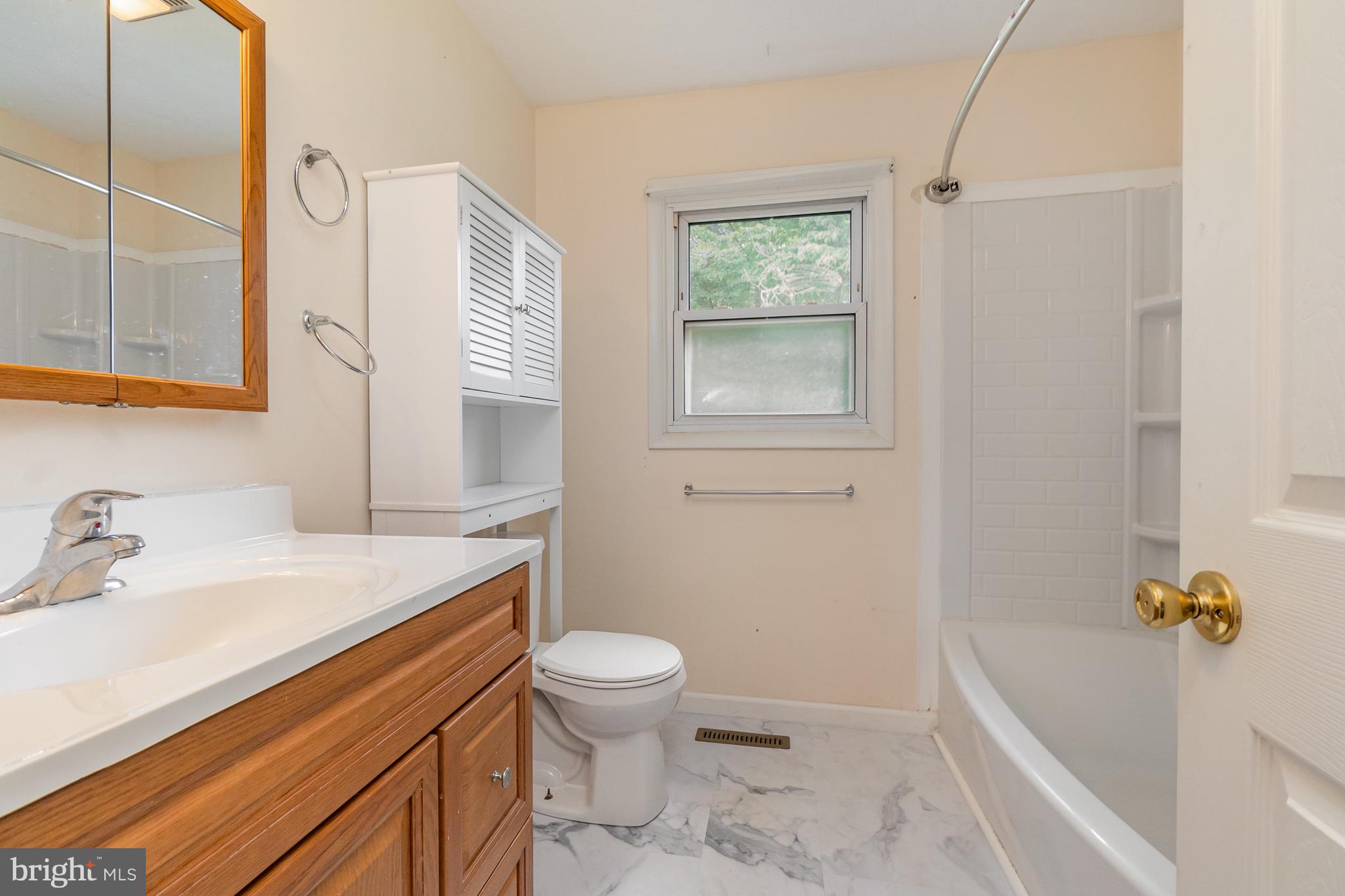 107 Jarmon Road Elkton, MD 21921 - Photo 21 of 33 a bathroom with a sink toilet and shower
