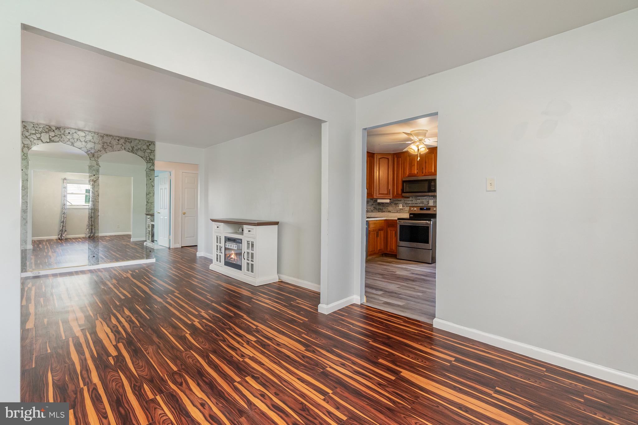 107 Jarmon Road Elkton, MD 21921 - Photo 9 of 33 a view of a hallway view with wooden floor and staircase