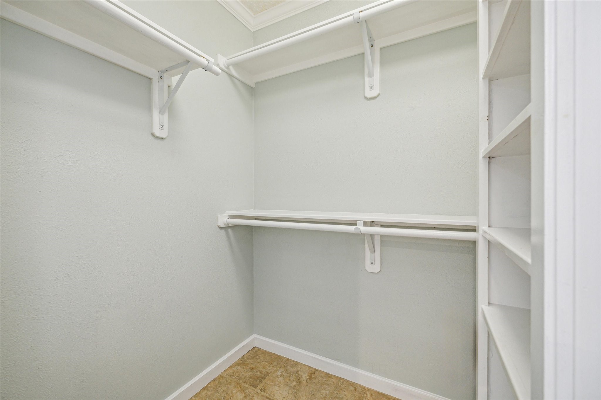 3613 Lazy Spring Drive Houston, TX 77080 - Photo 9 of 22 a view of a room with racks on the wall