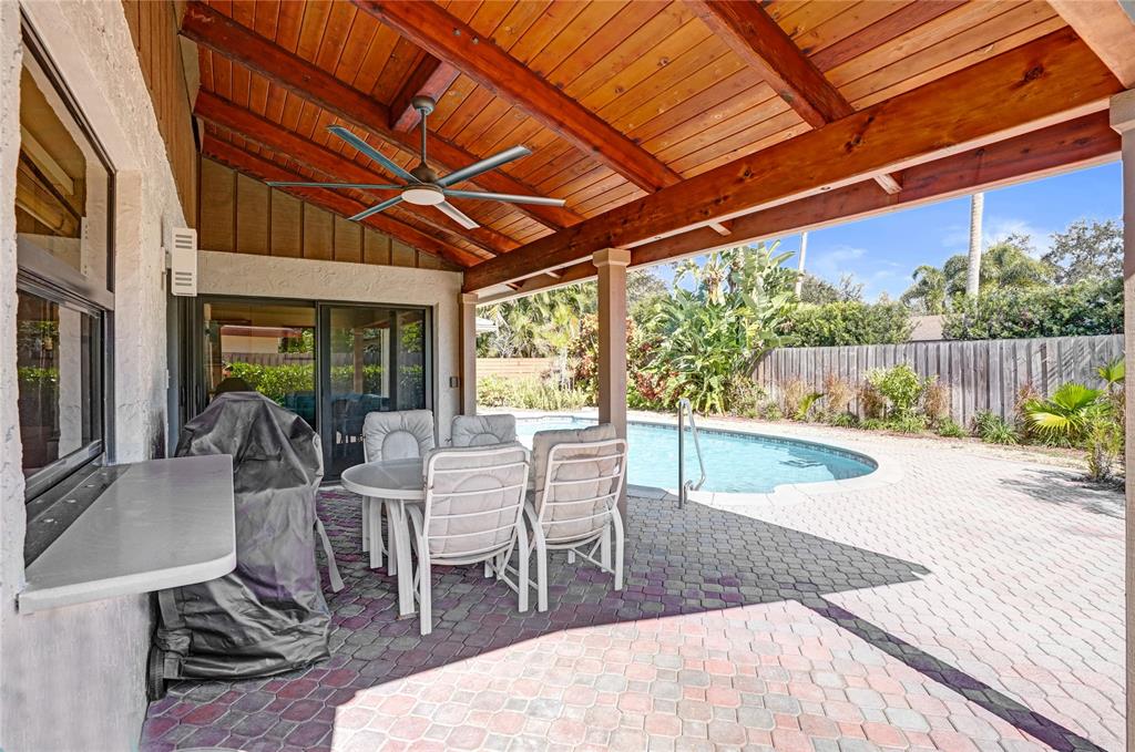 3088 Northwest 26th Avenue Boca Raton, FL 33434 - Photo 28 of 34 Covered Patio overlooking the pool.