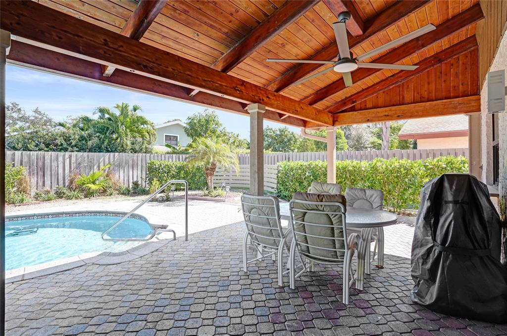 3088 Northwest 26th Avenue Boca Raton, FL 33434 - Photo 29 of 34 Covered Patio overlooking the pool.