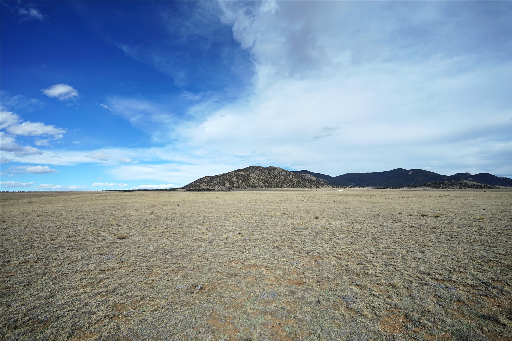 a view of an lake and a mountain