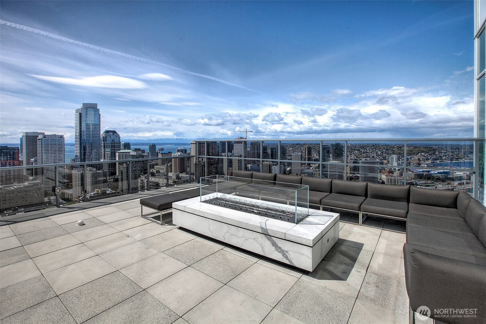 1321 Seneca Street, Unit 206 Seattle, WA 98101 - Photo 26 of 35 a view of a terrace with couches and potted plants