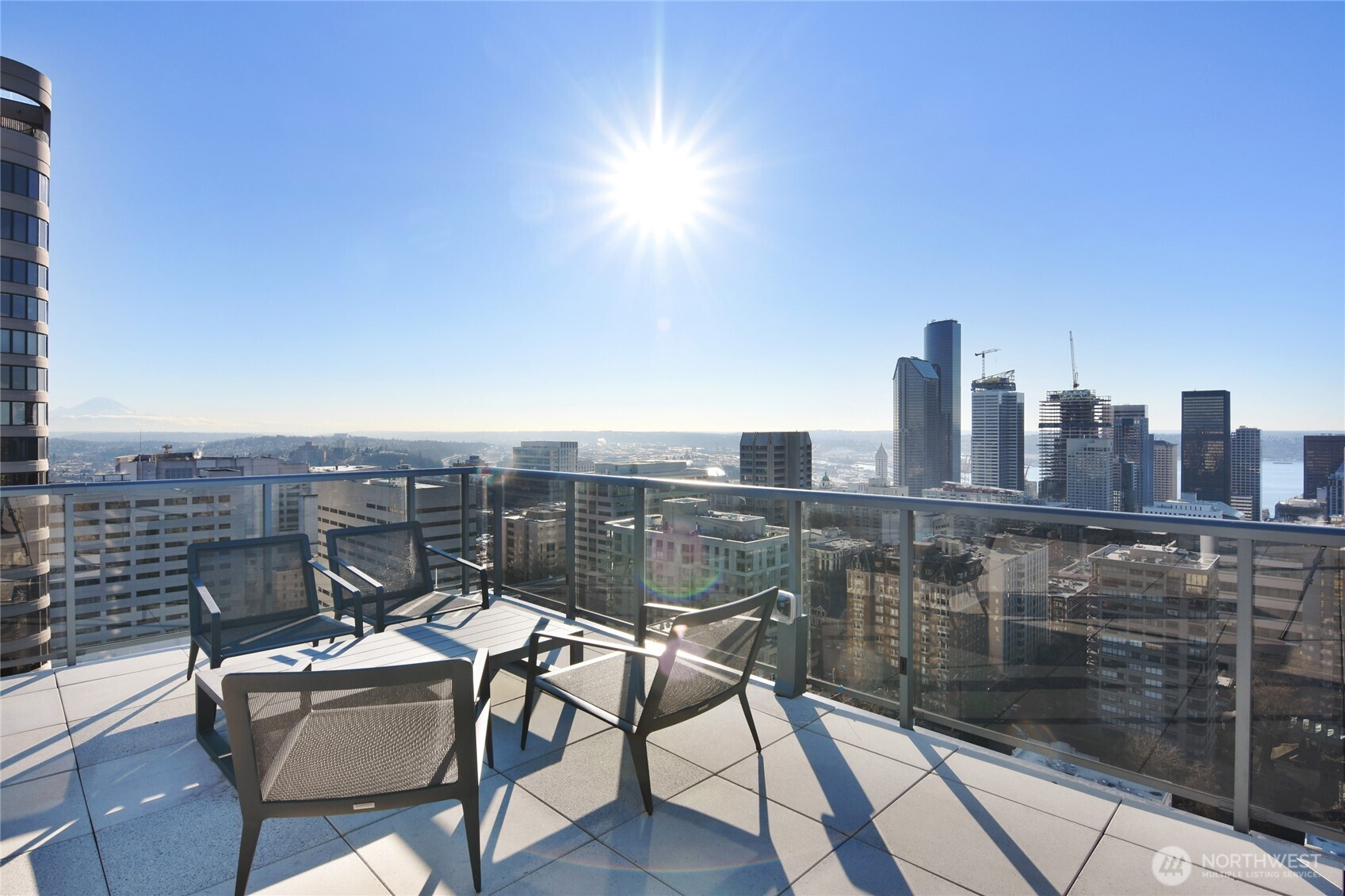 1321 Seneca Street, Unit 206 Seattle, WA 98101 - Photo 28 of 35 a view of a terrace with sitting area