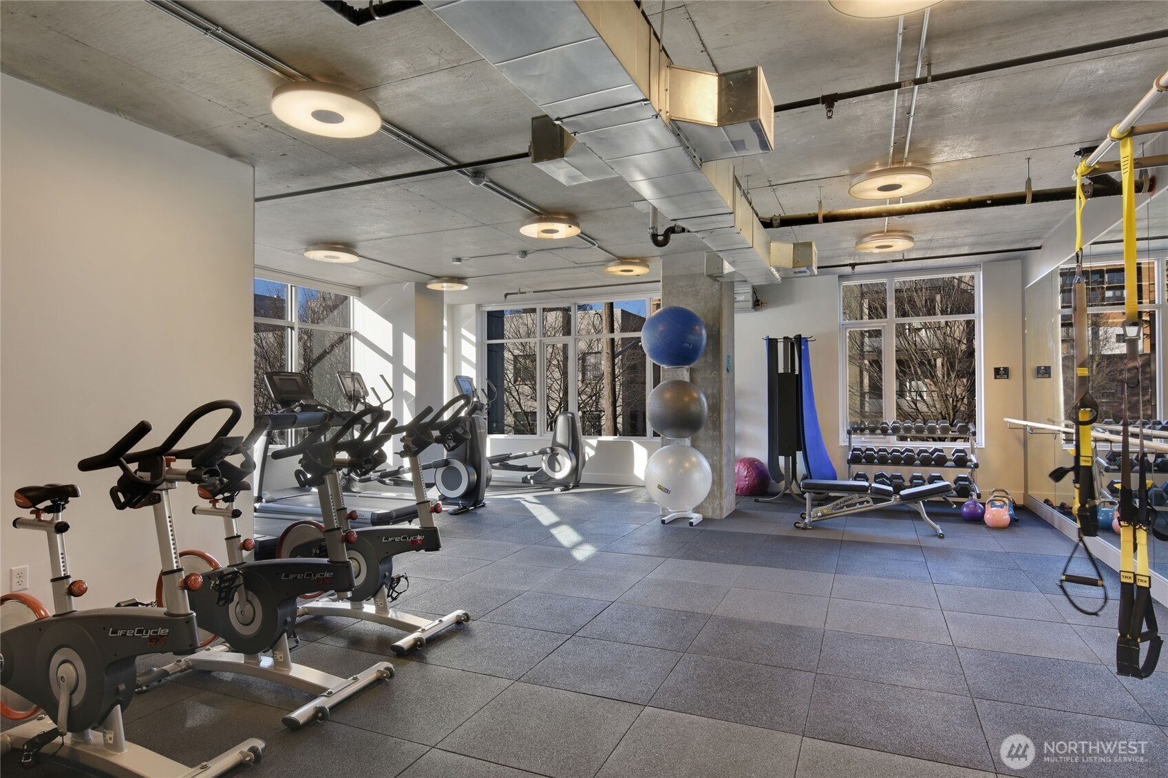 1321 Seneca Street, Unit 206 Seattle, WA 98101 - Photo 31 of 35 a view of a room with gym equipment