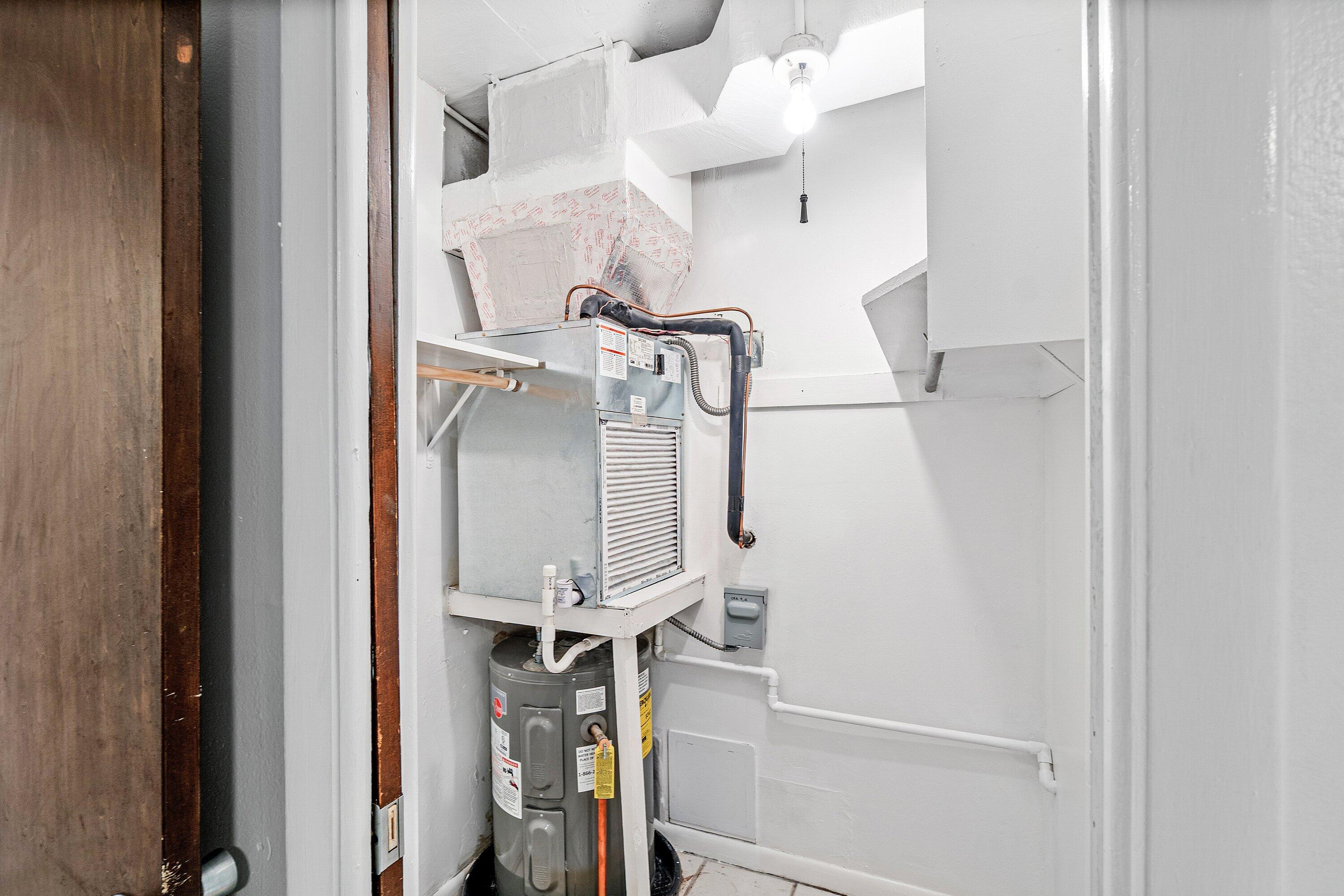 626 North Federal Highway, Unit 3 Lake Worth Beach, FL 33460 - Photo 19 of 23 a view of staircase with white walls