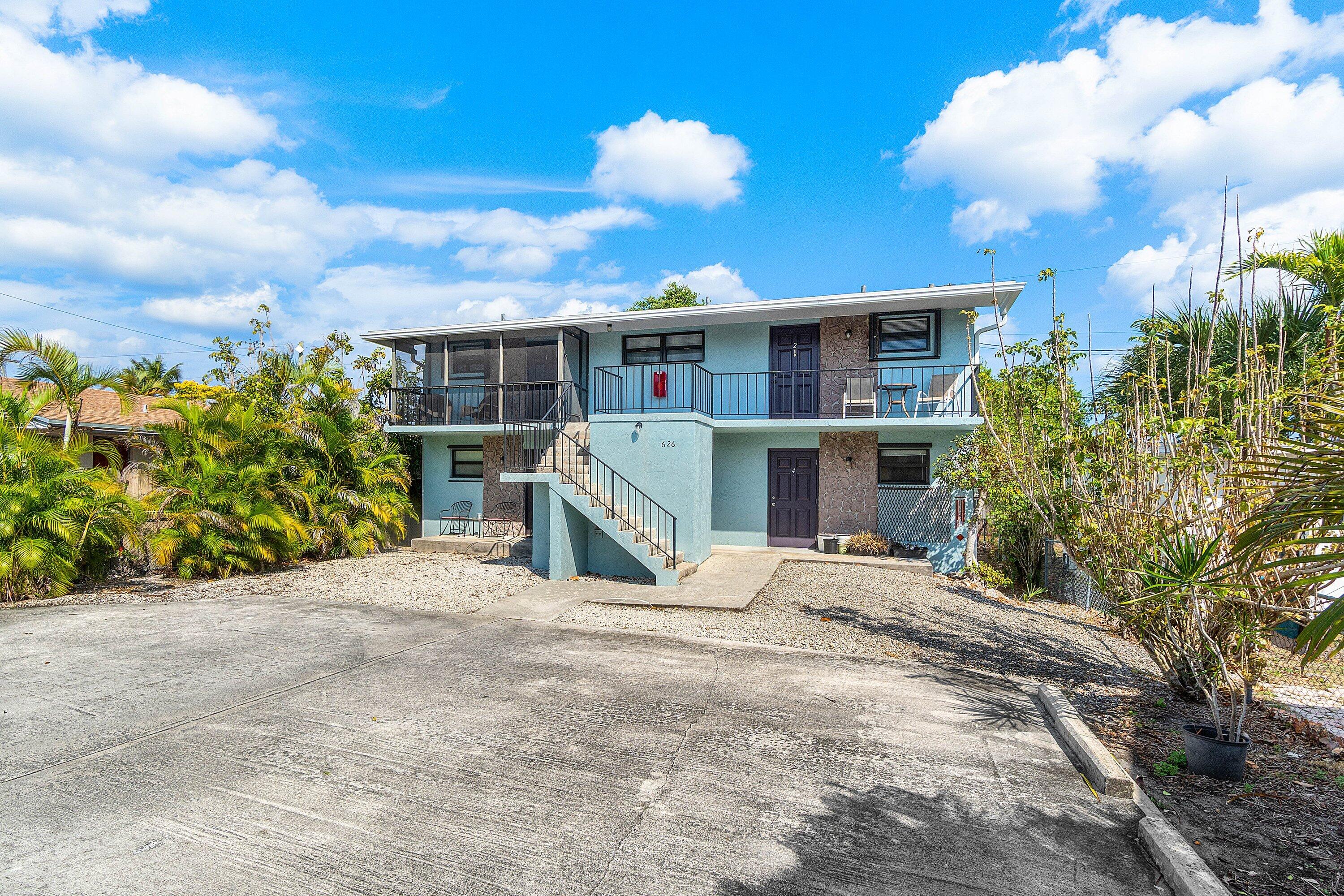 626 North Federal Highway, Unit 3 Lake Worth Beach, FL 33460 - Photo 2 of 23 a view of a house with a patio