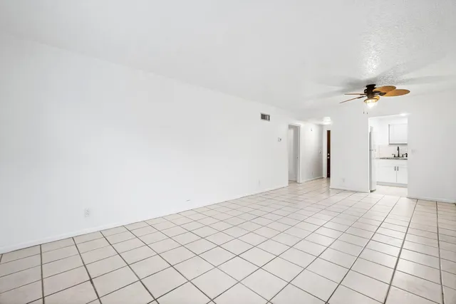 a view of an empty room and window