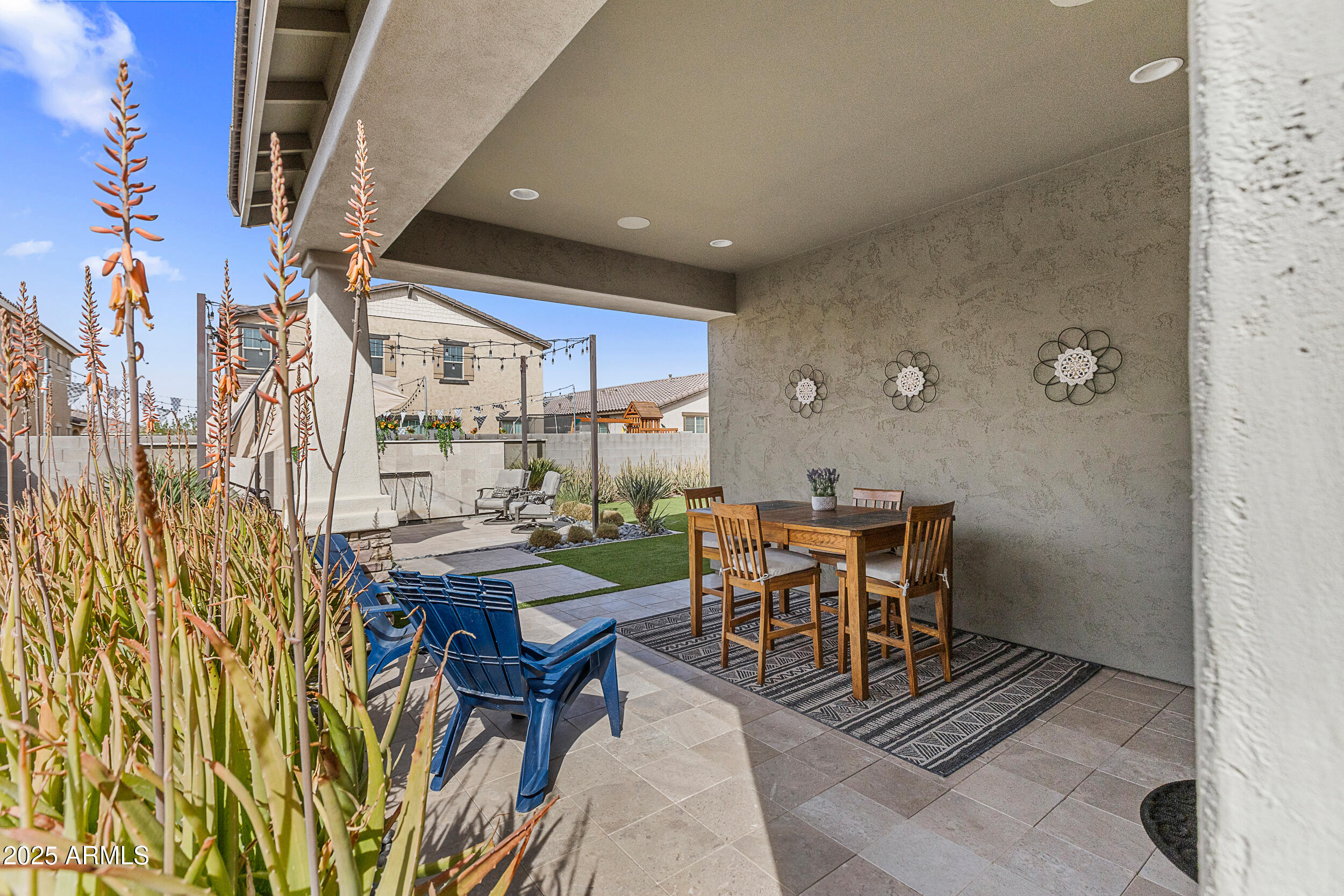 23030 East Estrella Road Queen Creek, AZ 85142 - Photo 43 of 47 a dining room with furniture and wooden floor