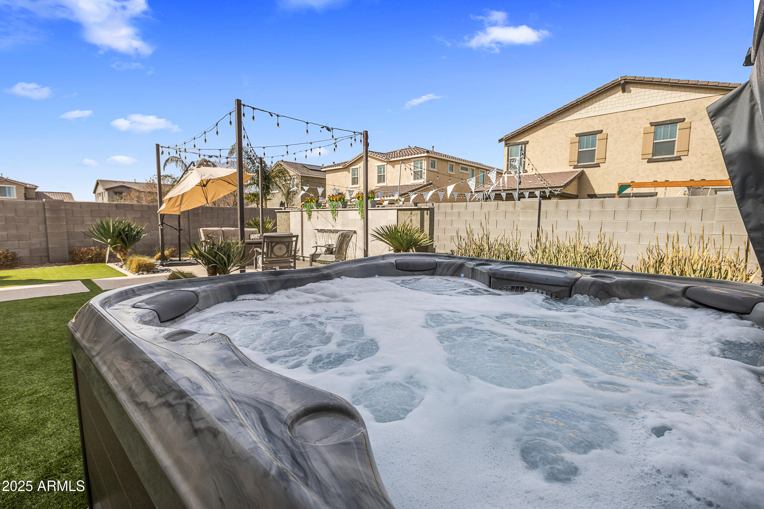 23030 East Estrella Road Queen Creek, AZ 85142 - Photo 44 of 47 a view of a house with a yard