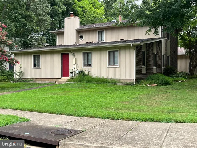 a view of a backyard of the house