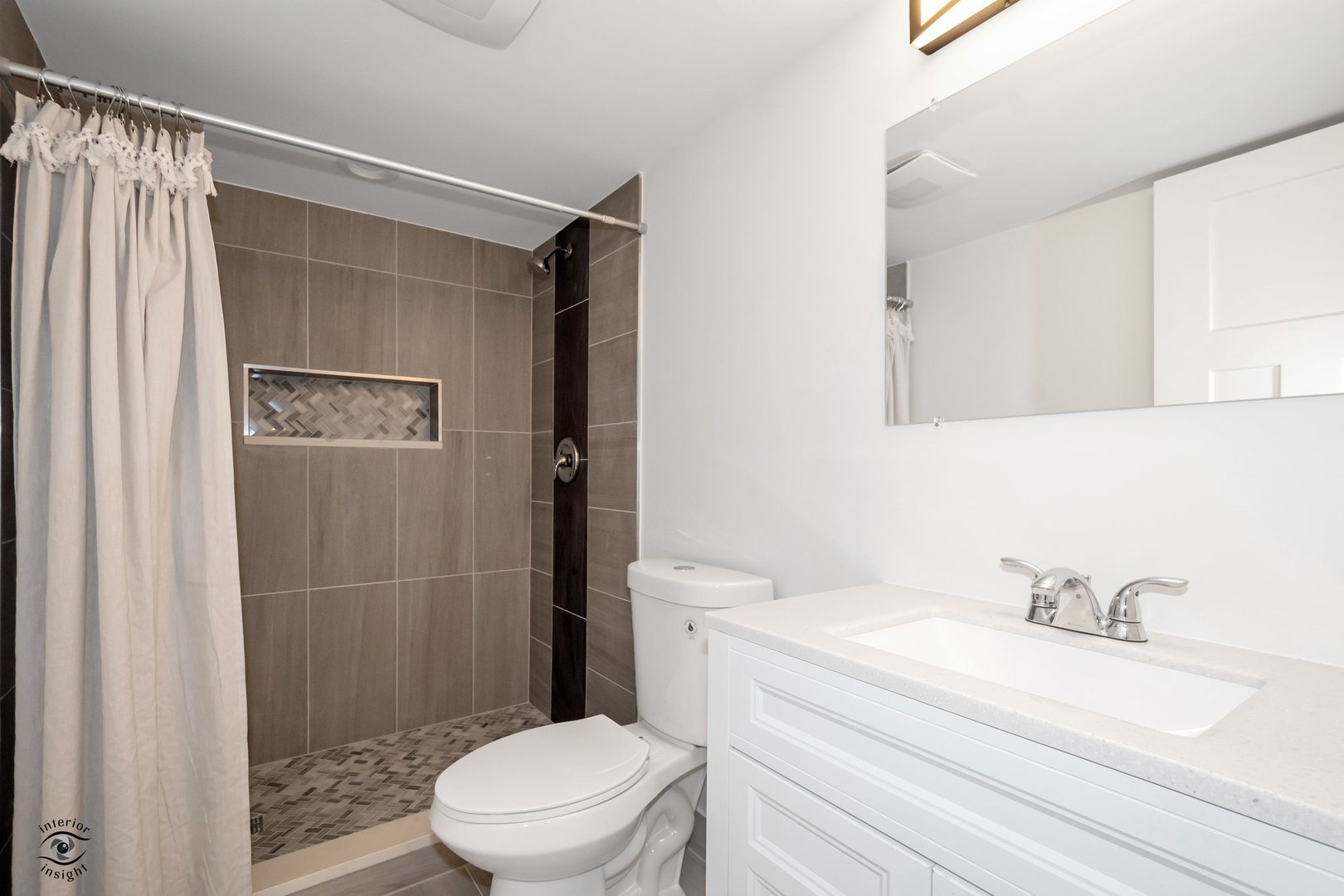 Undisclosed Address Lansing, IL 60438 - Photo 13 of 23 a bathroom with a sink a toilet and shower