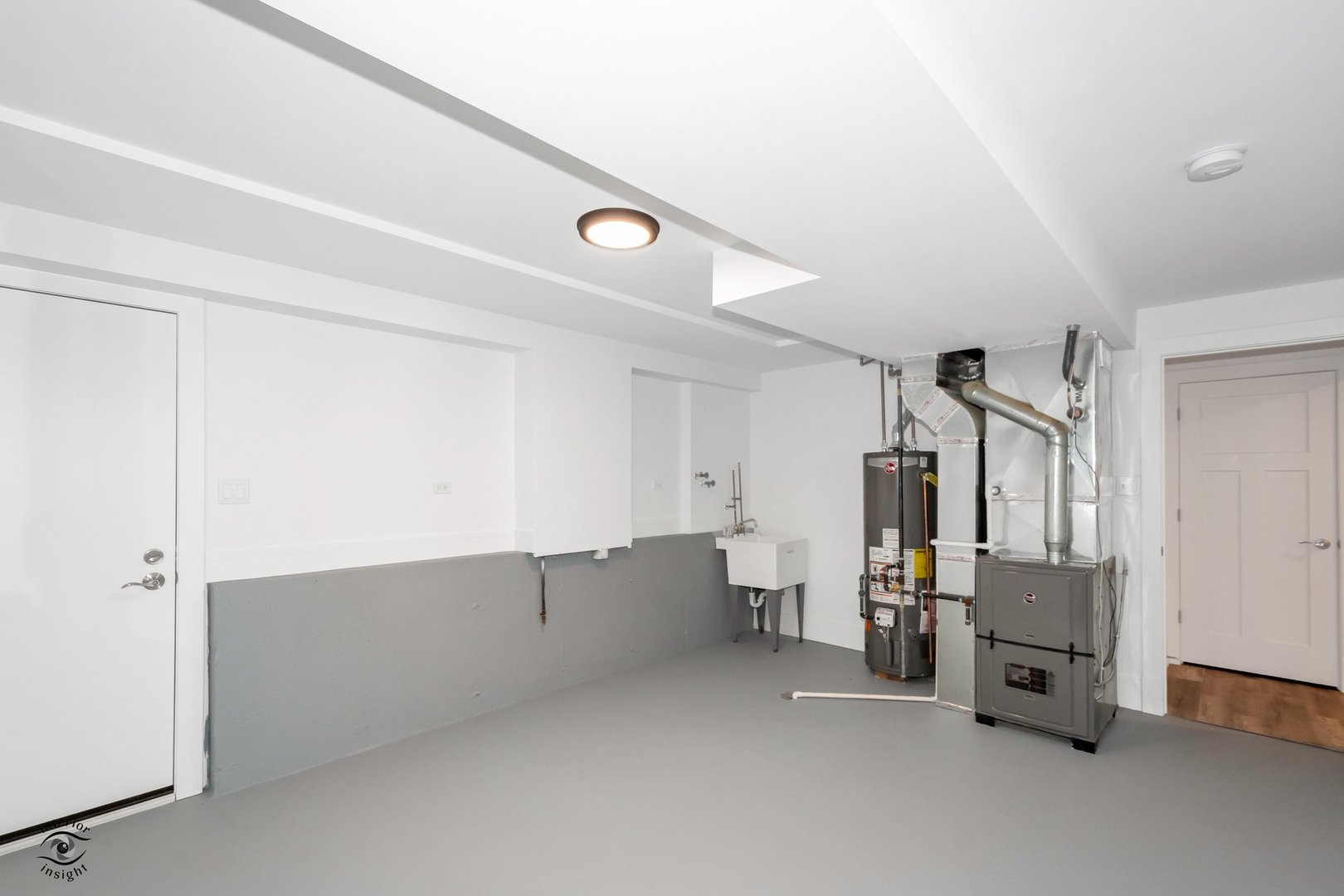 Undisclosed Address Lansing, IL 60438 - Photo 19 of 23 a view of kitchen and utility room