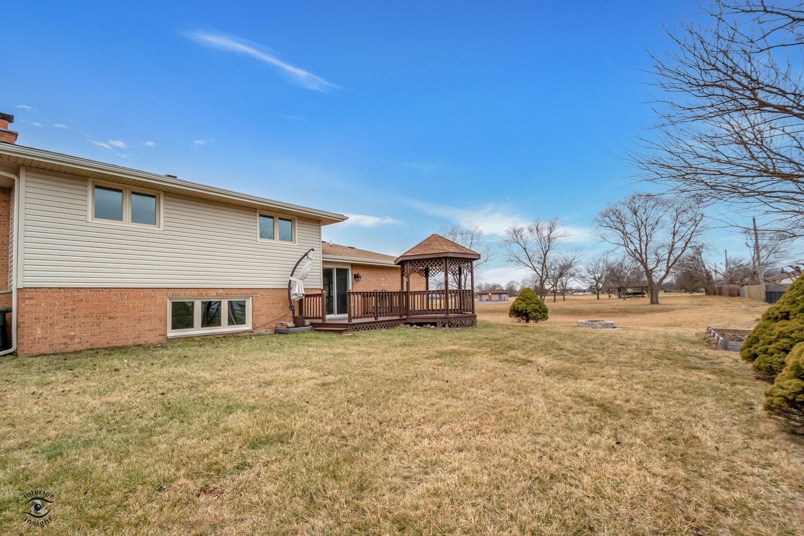 Undisclosed Address Lansing, IL 60438 - Photo 22 of 23 a view of a house with a yard