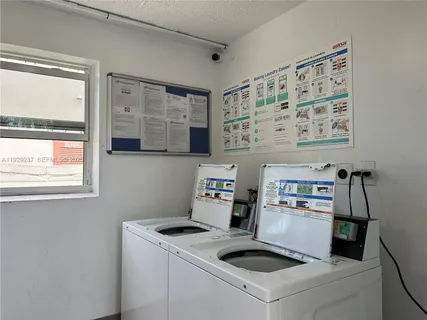 a view of kitchen and sink