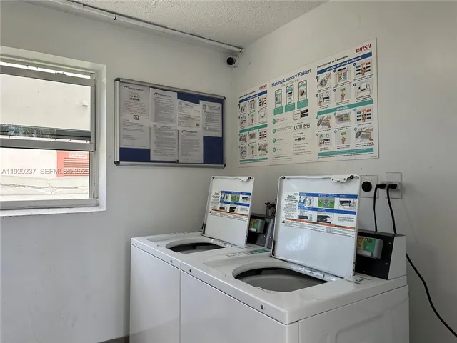 a view of kitchen and sink