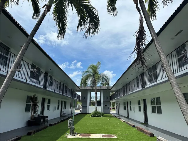 a view of building with yard