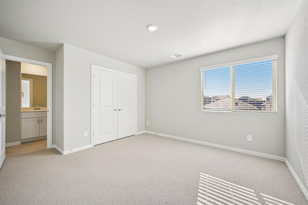 505 Stagg Street McKinney, TX 75069 - Photo 35 of 39 an empty room with windows