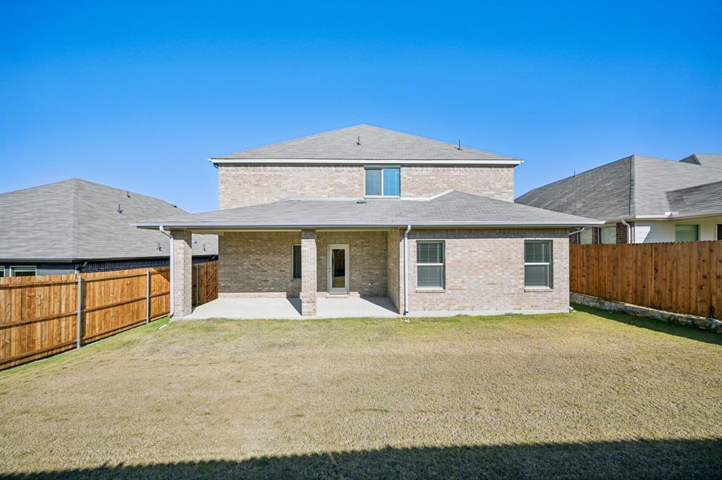 505 Stagg Street McKinney, TX 75069 - Photo 37 of 39 a front view of a house with a yard