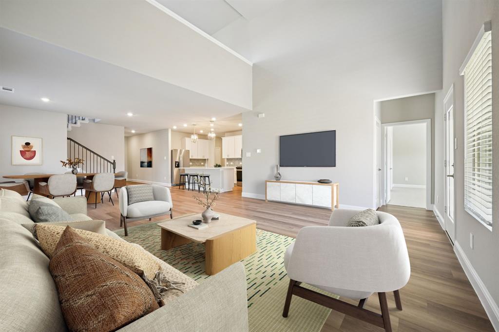 505 Stagg Street McKinney, TX 75069 - Photo 10 of 39 a living room with furniture and a flat screen tv