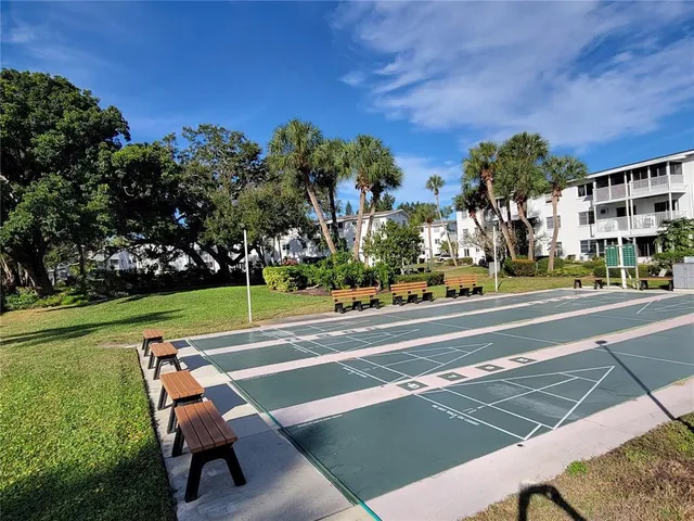 a view of a swimming pool with a patio