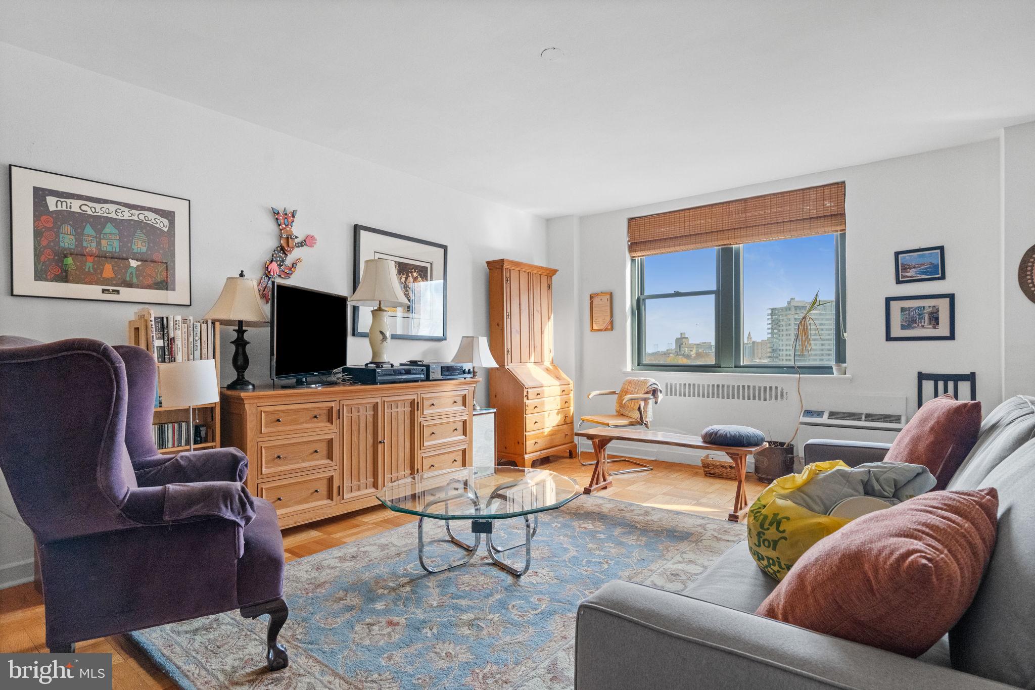 2601 Pennsylvania Avenue, Unit 1132 Philadelphia, PA 19130 - Photo 11 of 28 a living room with furniture and a flat screen tv