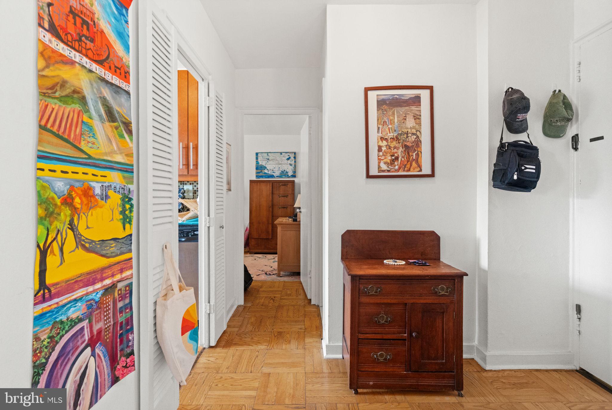 2601 Pennsylvania Avenue, Unit 1132 Philadelphia, PA 19130 - Photo 12 of 28 a bedroom with a bed and a bookshelf