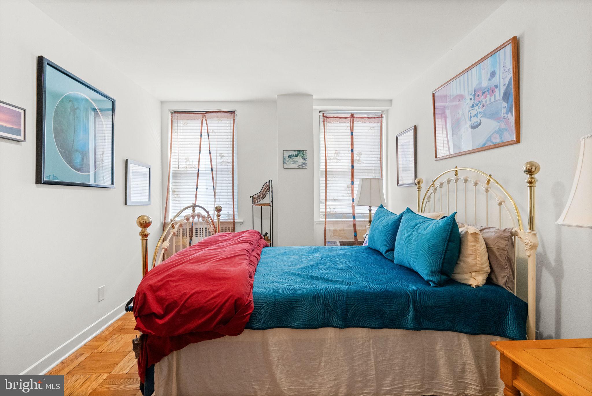 2601 Pennsylvania Avenue, Unit 1132 Philadelphia, PA 19130 - Photo 14 of 28 a bedroom with a bed and cupboard