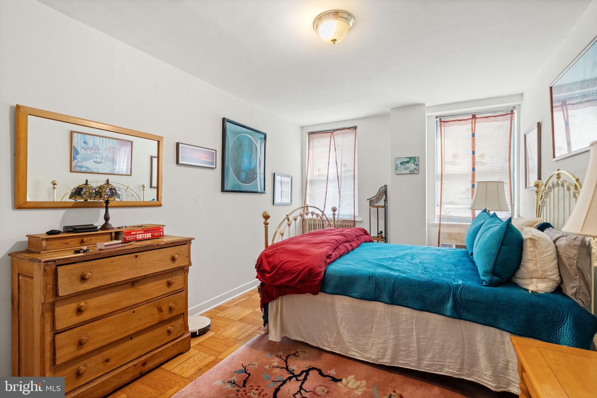 2601 Pennsylvania Avenue, Unit 1132 Philadelphia, PA 19130 - Photo 15 of 28 a living room with furniture and a window