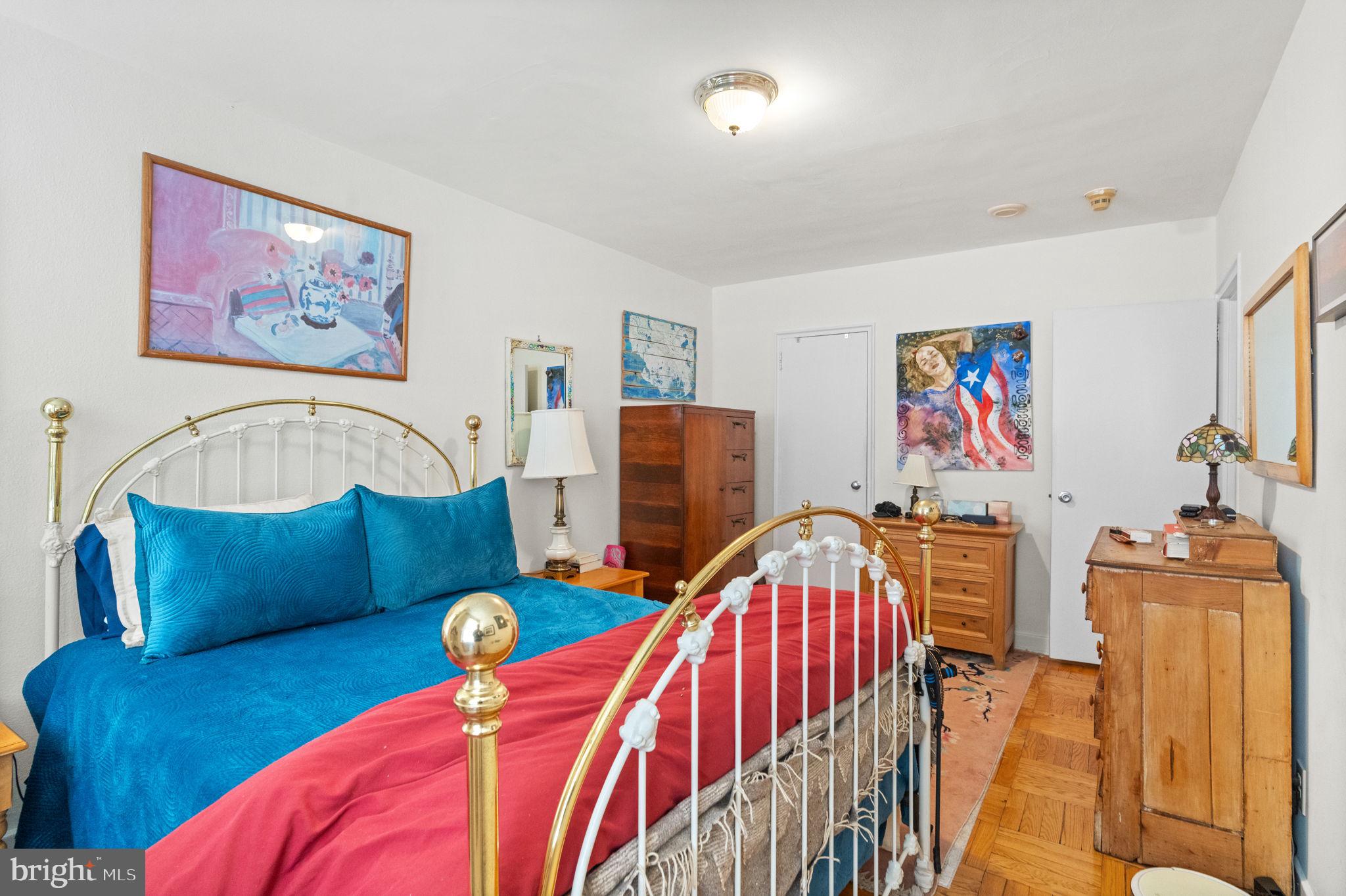 2601 Pennsylvania Avenue, Unit 1132 Philadelphia, PA 19130 - Photo 16 of 28 a bedroom with furniture and a couch