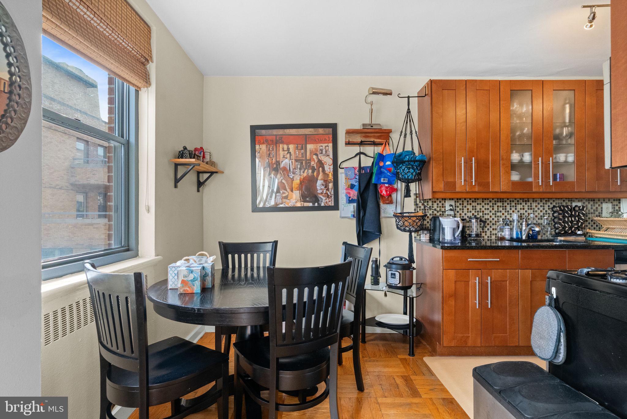 2601 Pennsylvania Avenue, Unit 1132 Philadelphia, PA 19130 - Photo 23 of 28 a view of a dining room with furniture window and outside view