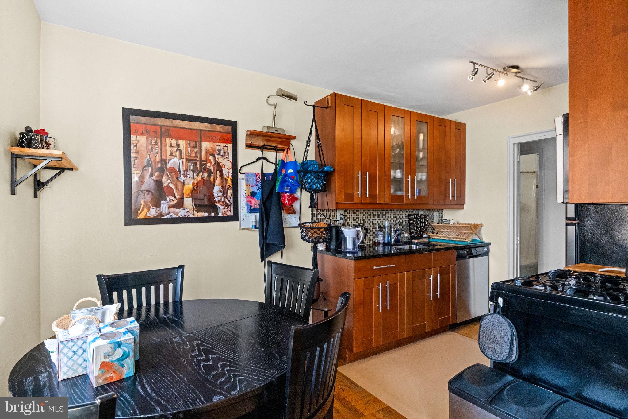 2601 Pennsylvania Avenue, Unit 1132 Philadelphia, PA 19130 - Photo 24 of 28 a living room with furniture and a large window