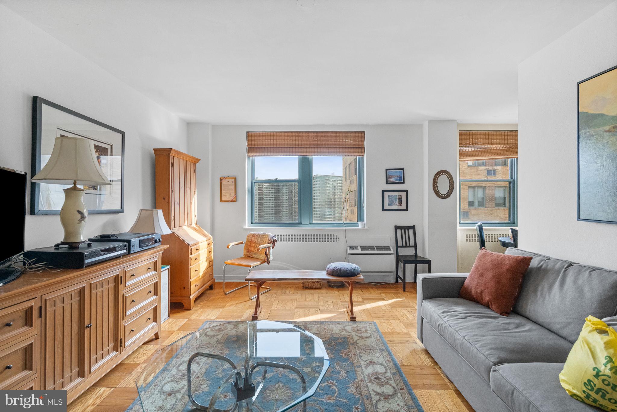 2601 Pennsylvania Avenue, Unit 1132 Philadelphia, PA 19130 - Photo 8 of 28 a living room with furniture and a window