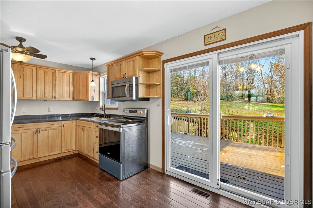 557 Ball Park Road Camdenton, MO 65020 - Photo 14 of 52 Dining area to Kitchen & Back Deck
