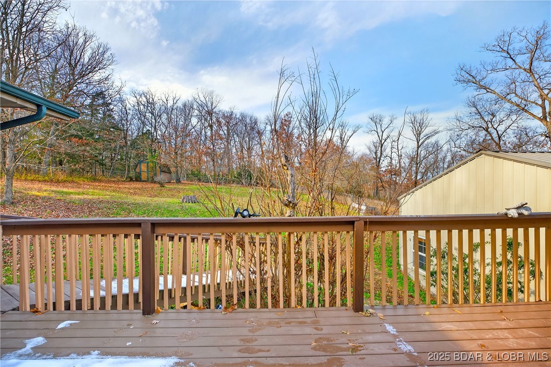 557 Ball Park Road Camdenton, MO 65020 - Photo 16 of 52 Back deck to back yard