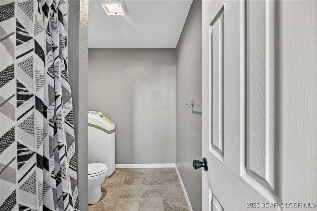557 Ball Park Road Camdenton, MO 65020 - Photo 35 of 52 Lower level bathroom