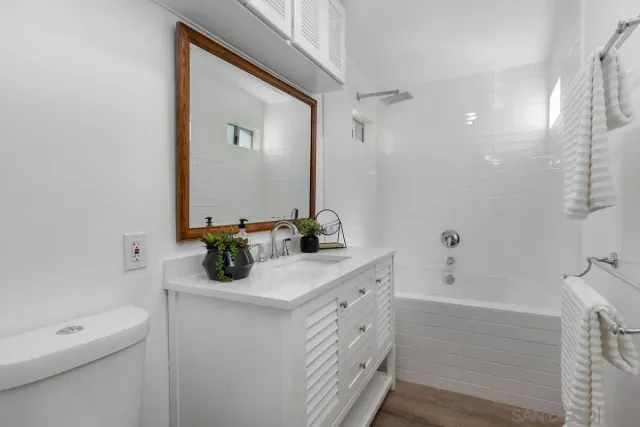 a bathroom with a sink and a bathtub