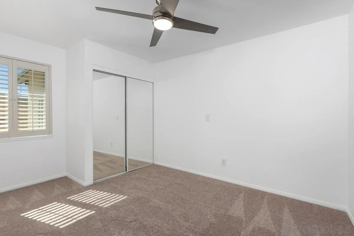 2567 Pheasant Drive San Diego, CA 92123 - Photo 21 of 31 a view of an empty room with a window