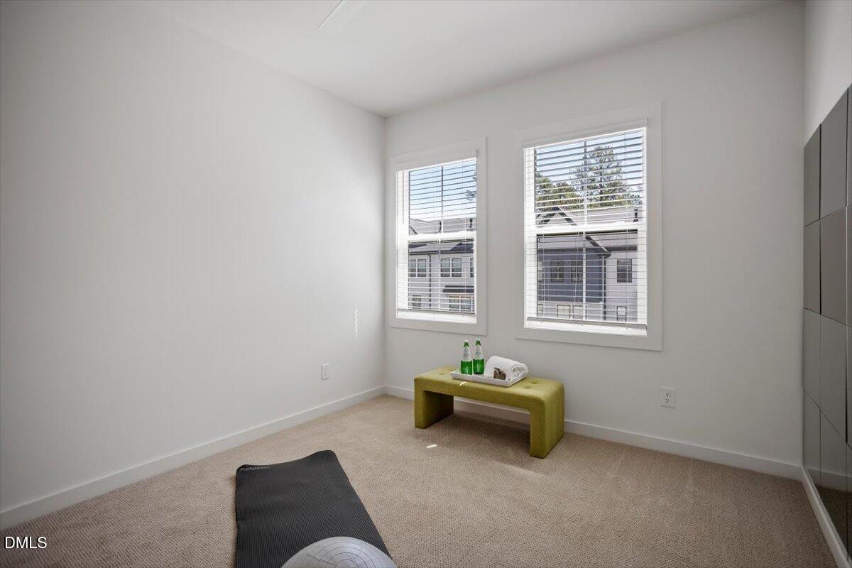 6419 Tanner Oak Lane Raleigh, NC 27613 - Photo 31 of 39 a room with furniture and window