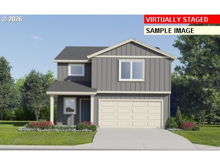 5757 Bainbridge Road Eugene, OR 97402 - Photo 1 of 22 a view of a house with a yard and garage