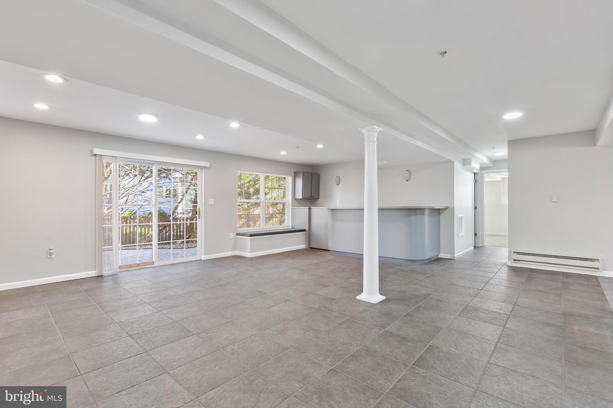 11400 Belvidere Road Bowie, MD 20721 - Photo 35 of 49 Walk-out recreation room w/ ceramic flooring