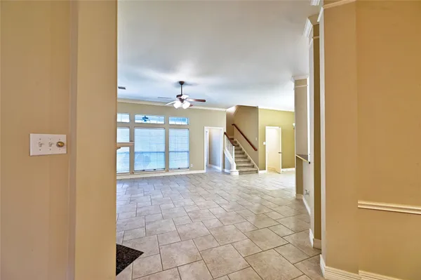 a view of an empty room with a fireplace