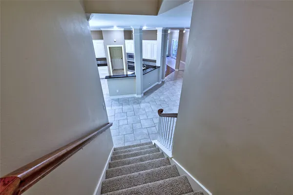 a view of an entryway with a front door