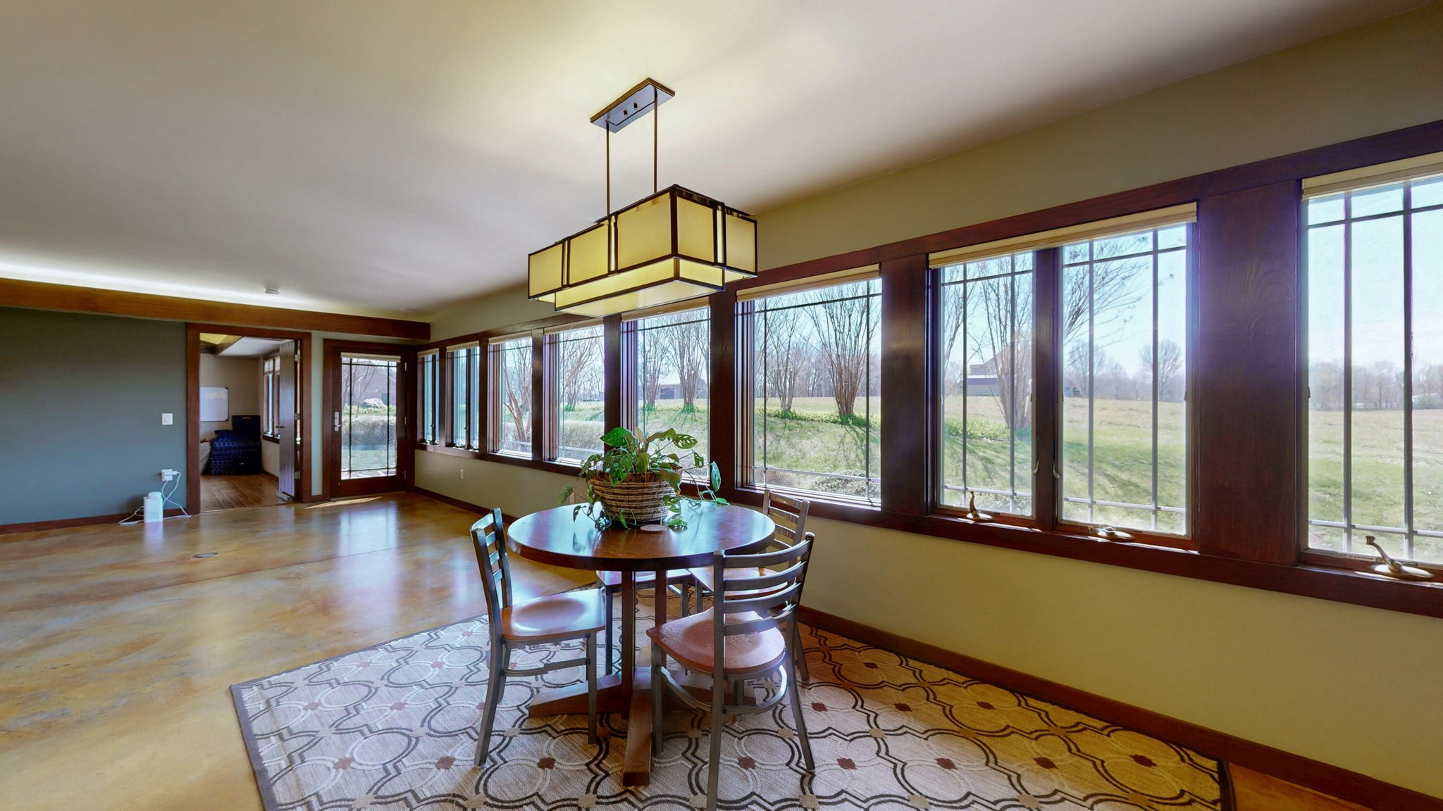 205 Lewis Lane Clinton, KY 42031 - Photo 11 of 86 a dining room with furniture wooden floor a chandelier and a rug