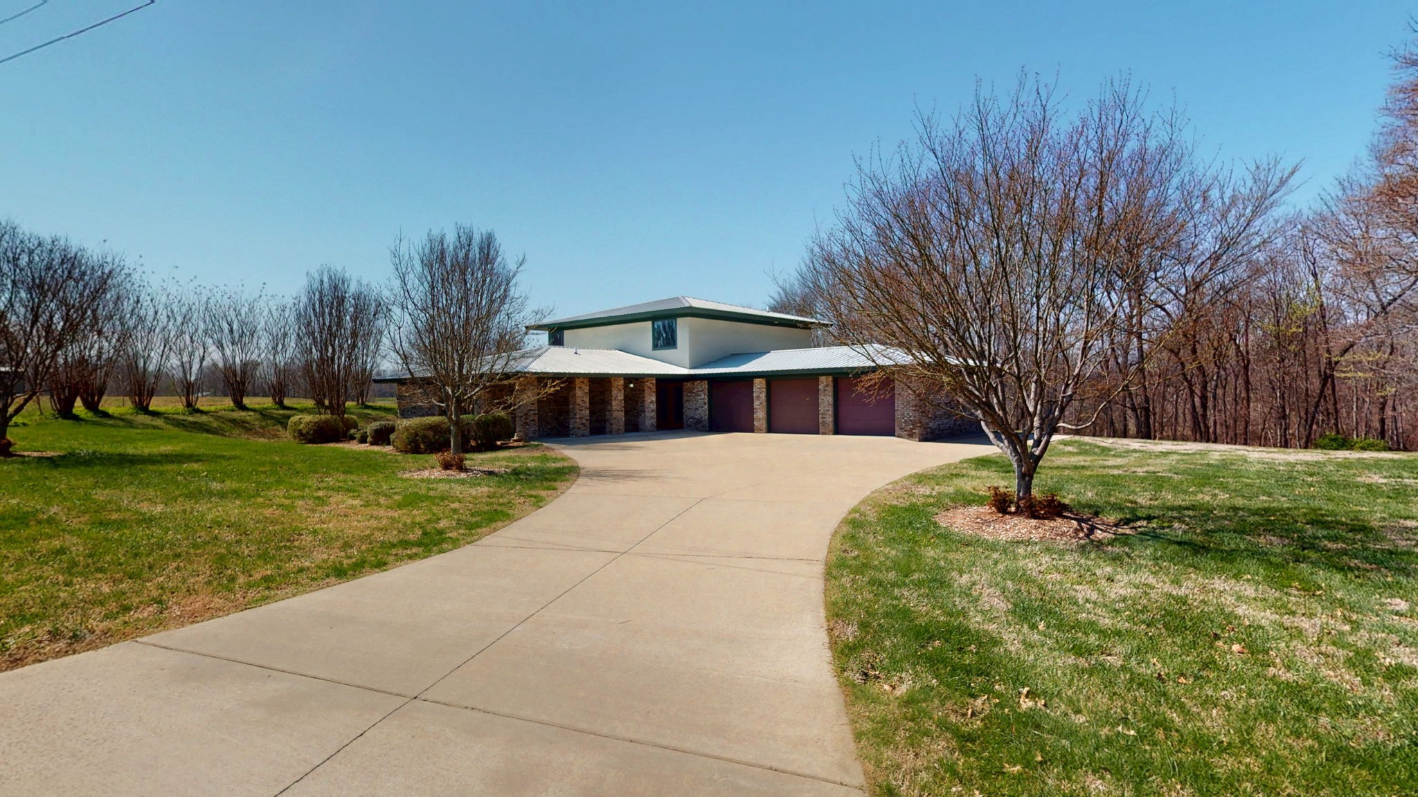 205 Lewis Lane Clinton, KY 42031 - Photo 37 of 86 a front view of a house with garden