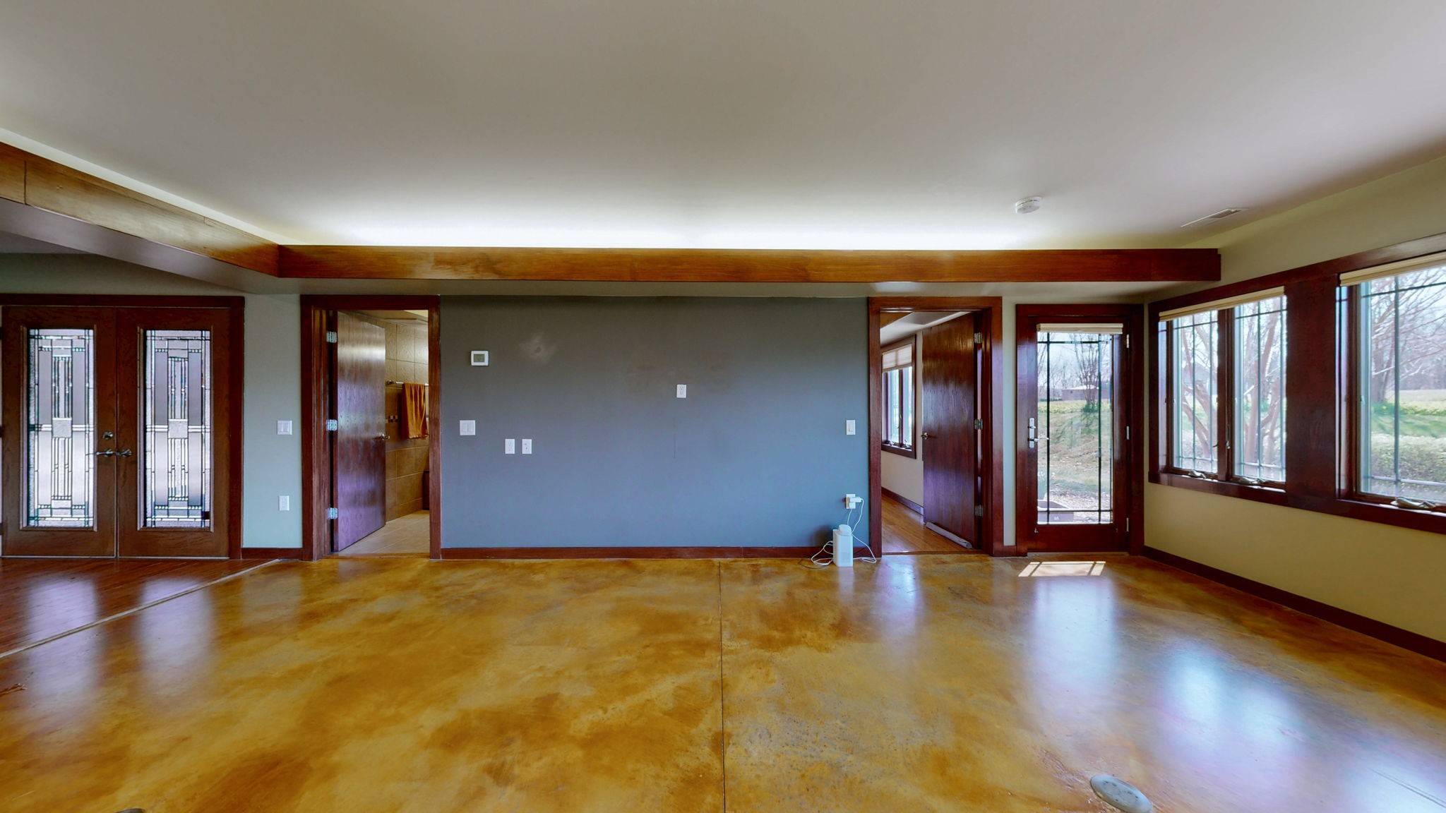 205 Lewis Lane Clinton, KY 42031 - Photo 6 of 86 a view of an empty room with wooden floor and a window