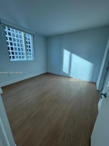 an empty room with a window