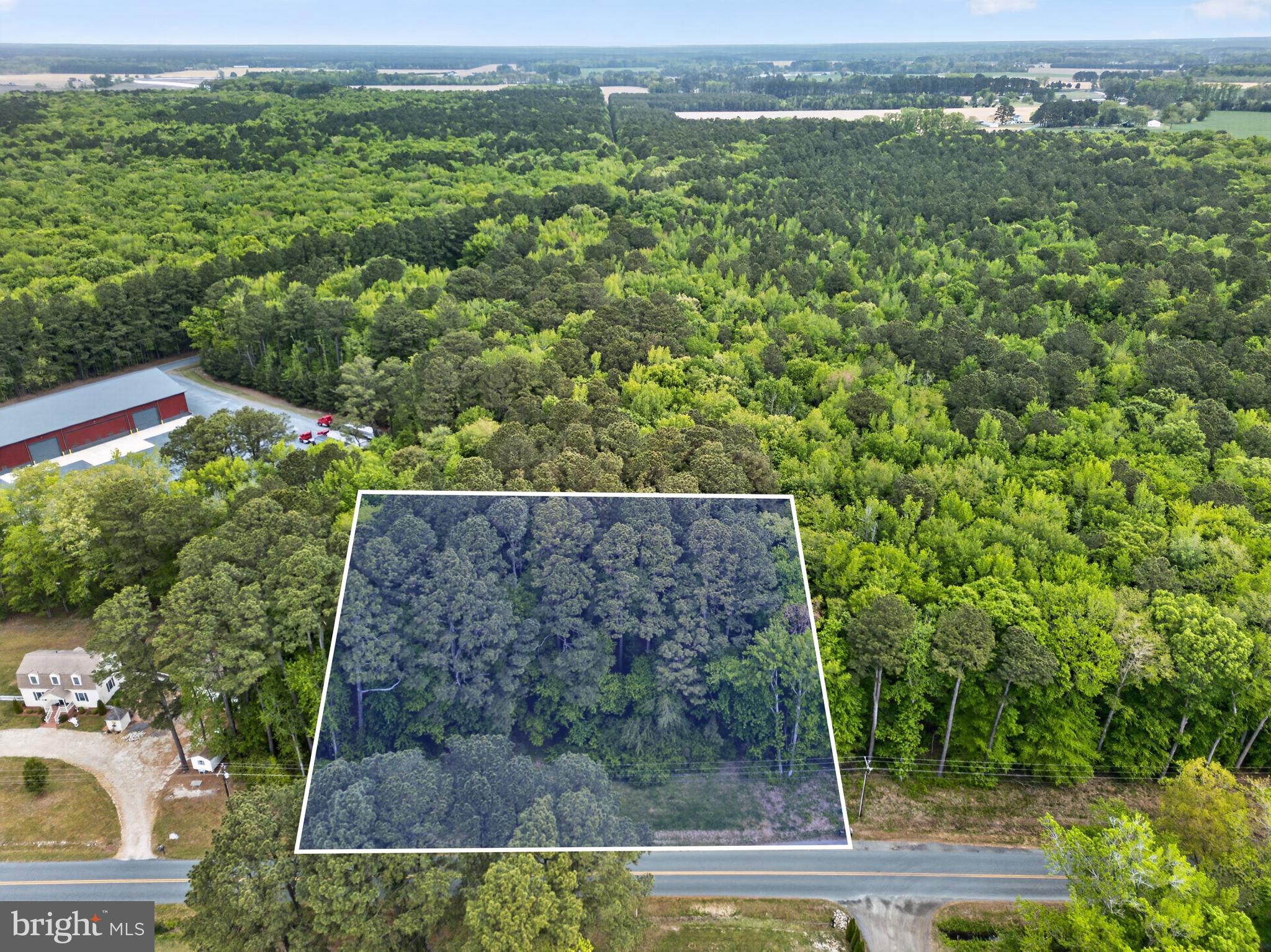 40 Revells Neck Road Westover, MD 21871 - Photo 1 of 20 an aerial view of a house with a yard